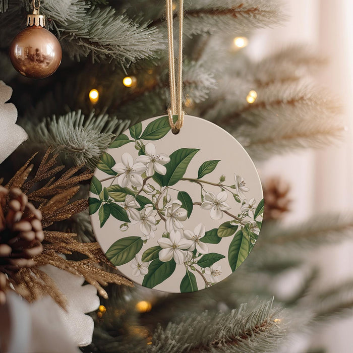 a christmas ornament hanging from a christmas tree