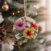 a christmas ornament hanging from a christmas tree
