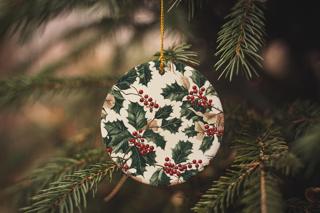 a ceramic ornament hanging from a christmas tree