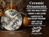 a ceramic ornament with blue berries on it