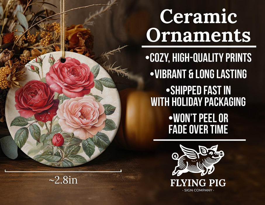 a ceramic ornament with roses painted on it