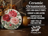 a ceramic ornament with roses painted on it