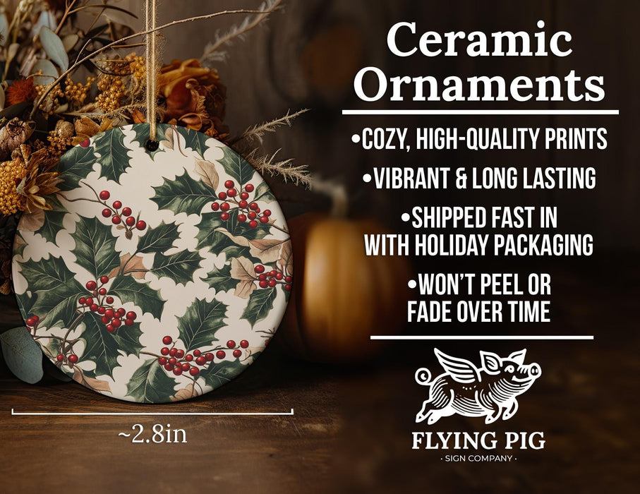 a ceramic ornament with holly and berries on it