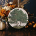 a ceramic ornament with a picture of a tree on it