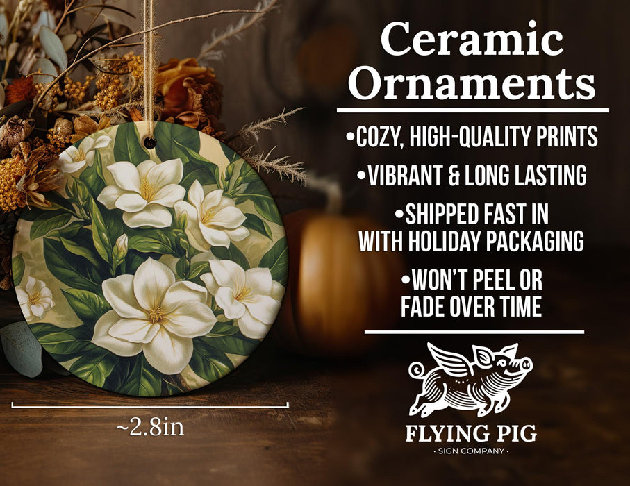 a ceramic ornament with white flowers on it
