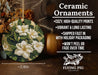a ceramic ornament with white flowers on it