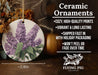 a ceramic ornament with purple flowers on it