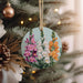 a close up of a christmas ornament on a tree