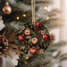 a christmas ornament hanging from a christmas tree