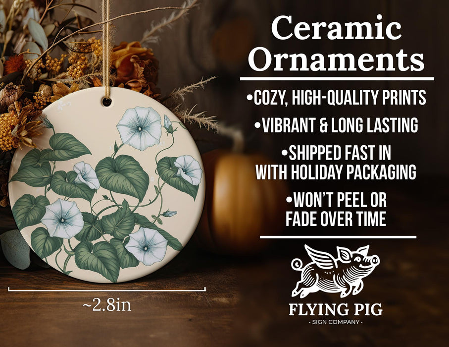 a ceramic ornament with flowers and leaves on it