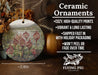 a ceramic ornament with a painting of flowers on it