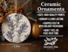 a ceramic ornament with purple flowers on it