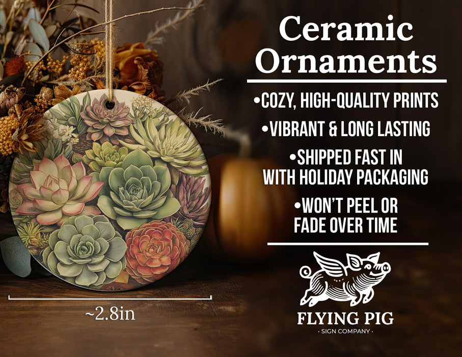a ceramic ornament with succulents on it