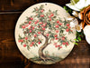 a picture of an apple tree on a plate