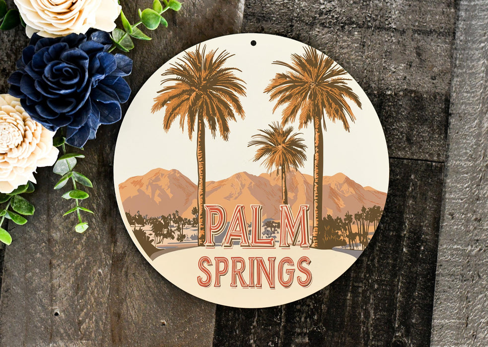 a sign that says palm springs next to a bouquet of flowers