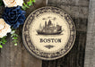 a plate with a picture of boston on it