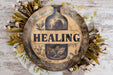 a picture of a bottle with the word healing on it