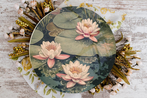 a plate with a painting of water lilies on it