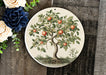 a picture of an apple tree on a plate