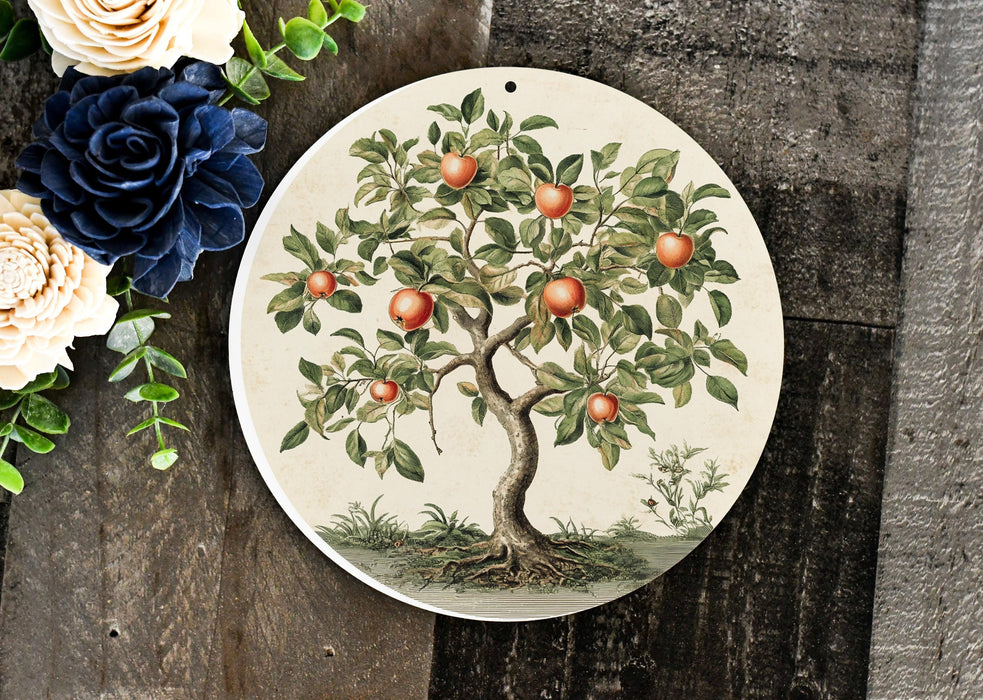 a picture of an apple tree on a plate