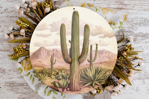 a plate with a painting of a cactus on it
