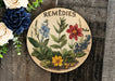 a plate with flowers and herbs painted on it