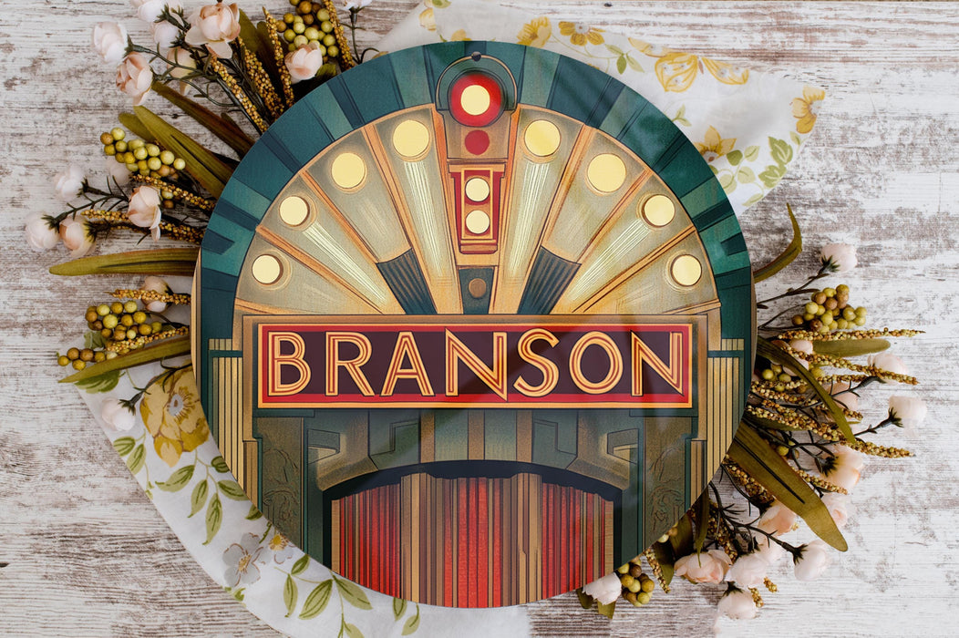 a close up of a sign on a wooden surface