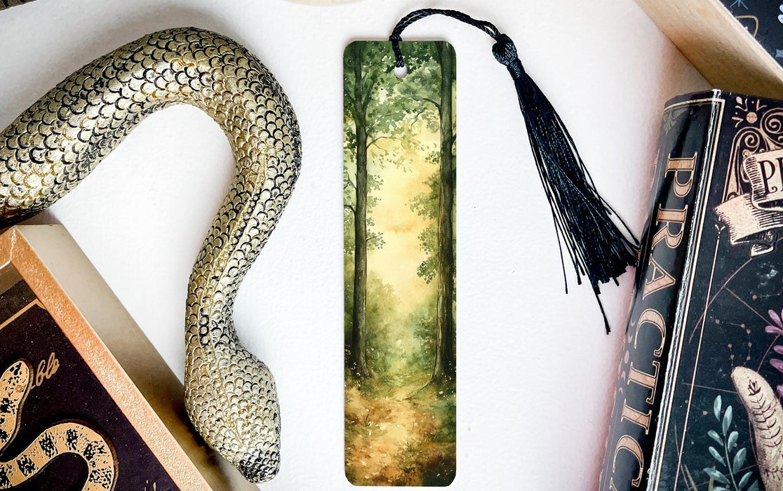 a snake, bookmarks, and other items on a table