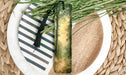 a close up of a plate with a plant on it