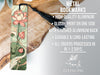 a metal bookmark with a flower design on it