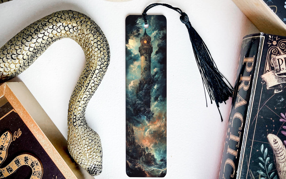 a bookmark, snake, and other items on a table