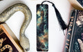a bookmark, snake, and other items on a table