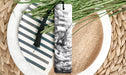 a bookmark with a picture of a ship on it