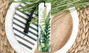 a close up of a plate with a plant on it