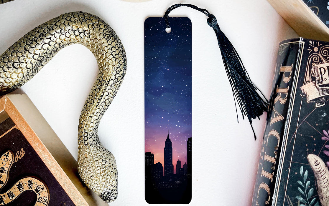 a bookmark with a picture of a city at night