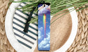 a bookmark with a picture of a rainbow on it
