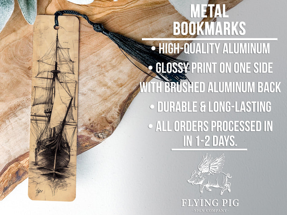 a metal bookmark with a ship on it