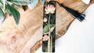 a bookmark with a floral design on it