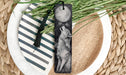a bookmark with a picture of a wolf on it