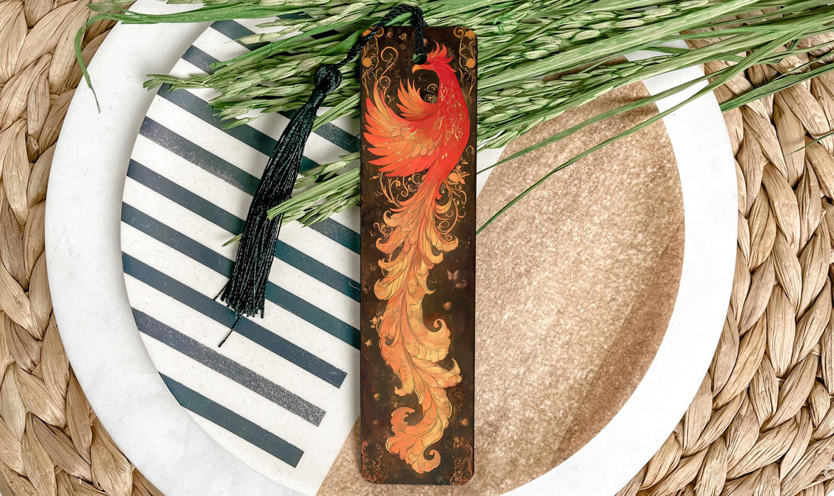 a decorative bookmark with a bird painted on it