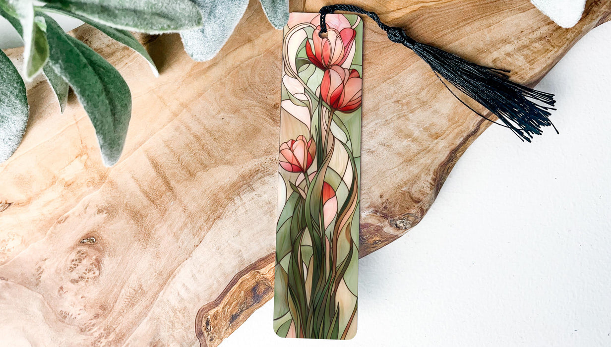 a piece of wood with a tassel hanging from it