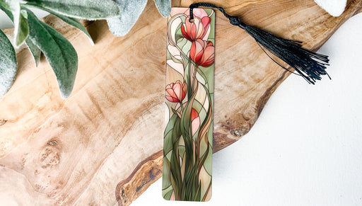 a piece of wood with a tassel hanging from it