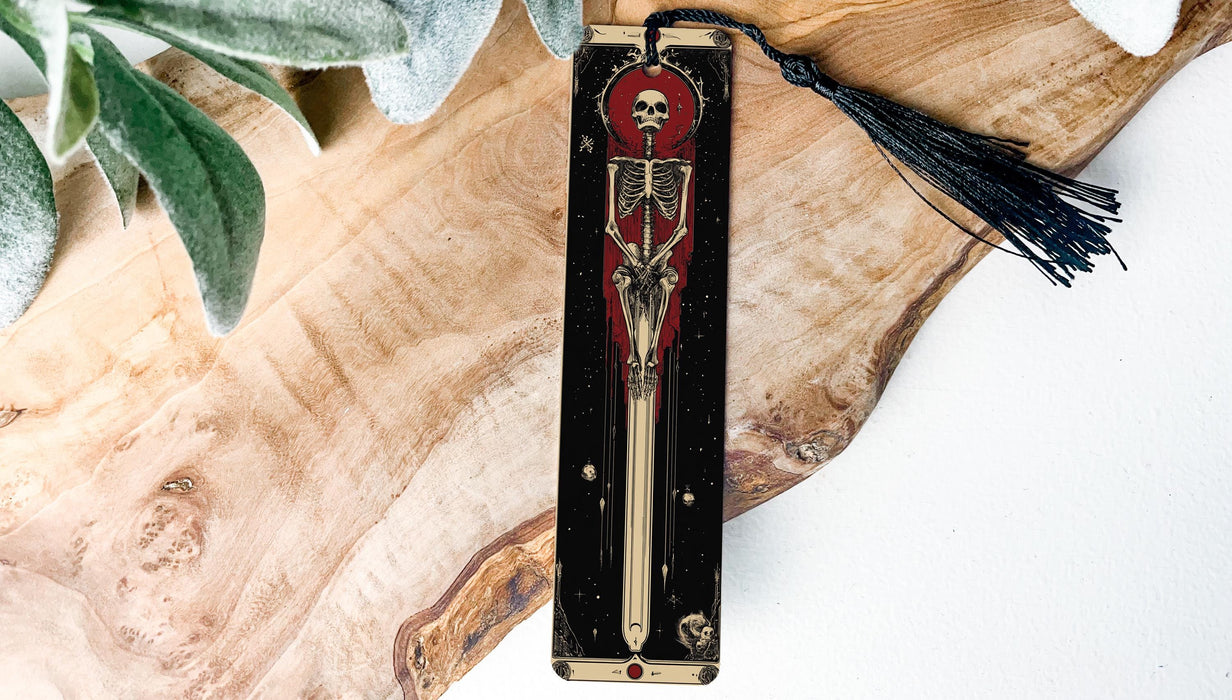 a wooden clock with a skeleton and a tassel hanging from it