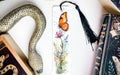 a bookmark with a picture of a butterfly on it