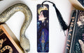 a bookmark with a picture of a woman and a snake on it