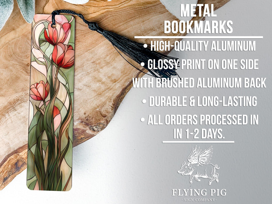 a metal bookmark with flowers on it