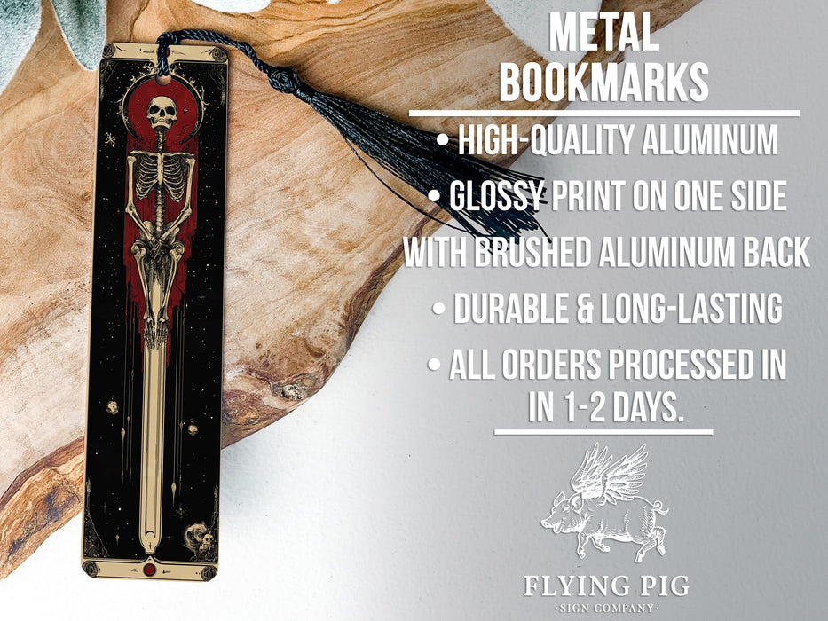 a metal bookmark with a skeleton on it