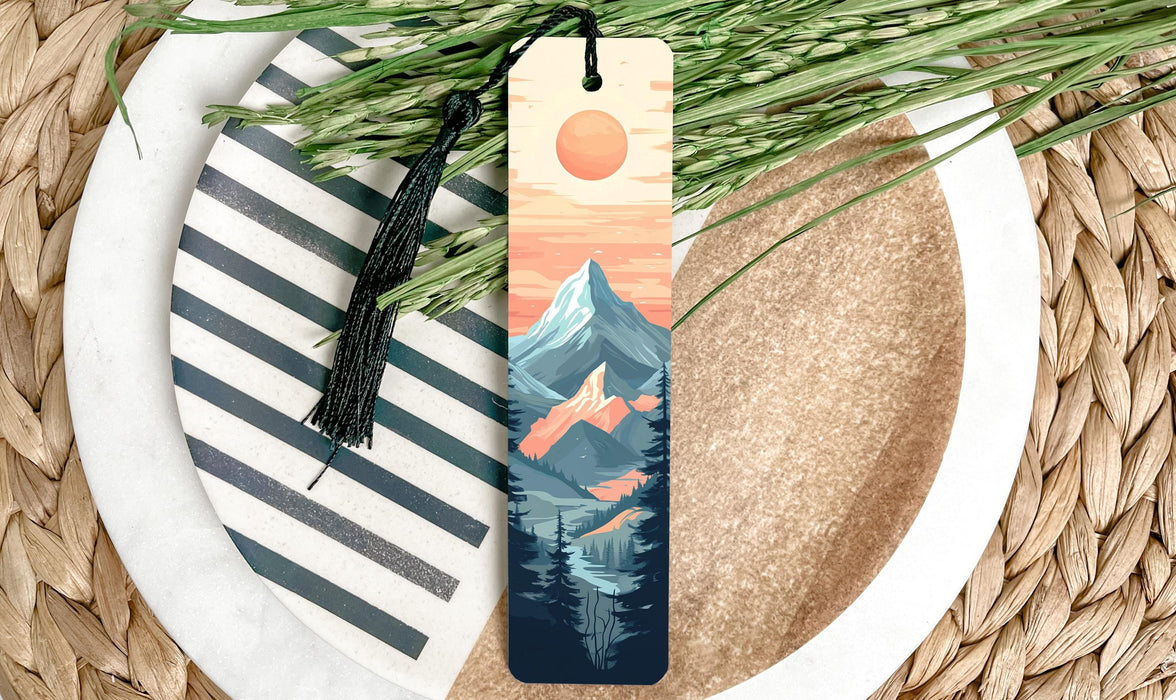 a bookmark with a mountain scene on it