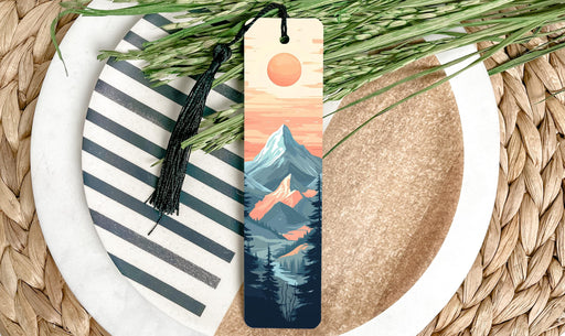 a bookmark with a mountain scene on it