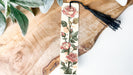 a bookmark with a rose design on it